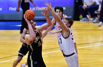 Nov 20, 2023; Honolulu, Hawaii, USA;  Purdue Boilermakers center Zach Edey (15) shoots while being defended by Gonzaga Bulldogs forward Ben Gregg (33) during the first half at SimpliFi Arena at Stan Sheriff Center. Mandatory Credit: Steven Erler-USA TODAY Sports