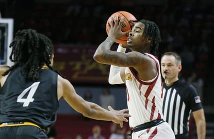 Iowa State Cyclones guard Keshon Gilbert (10) looks for pass the ball around Prairie View A&M Panthers guard Charles Smith IV (4) during the first half of a NCAA college basketball at Hilton Coliseum on Sunday, Dec. 10, 2023, in Ames, Iowa.