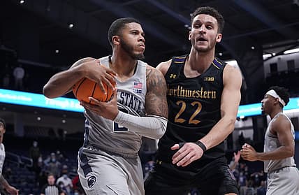 Jan 5, 2022; Evanston, Illinois, USA; Northwestern Wildcats forward Pete Nance (22) defends Penn State Nittany Lions guard Myles Dread (2) during the second half at Welsh-Ryan Arena. Mandatory Credit: David Banks-USA TODAY Sports
