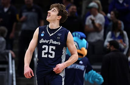 Mar 17, 2022; Indianapolis, IN, USA; Saint Peter's Peacocks guard Doug Edert (25) reacts after defeating the Kentucky Wildcats during the first round of the 2022 NCAA Tournament at Gainbridge Fieldhouse. Mandatory Credit: Trevor Ruszkowski-USA TODAY Sports