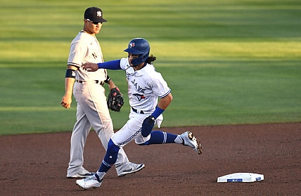 Apr 12, 2021; Dunedin, Florida, CAN; Toronto Blue Jays infielder Bo Bichette (11) heads for third base in the first inning against the New York Yankees at TD Ballpark. Mandatory Credit: Jonathan Dyer-USA TODAY Sports