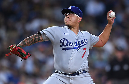 Aug 24, 2021; San Diego, California, USA; Los Angeles Dodgers starting pitcher Julio Urias (7) throws a pitch against the San Diego Padres during the first inning at Petco Park. Mandatory Credit: Orlando Ramirez-USA TODAY Sports