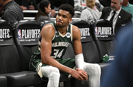 Apr 26, 2023; Milwaukee, Wisconsin, USA; Milwaukee Bucks forward Giannis Antetokounmpo (34) sits on the bench after a 128-126 loss to the Miami Heat during game five of the 2023 NBA Playoffs at Fiserv Forum. Mandatory Credit: Michael McLoone-USA TODAY Sports