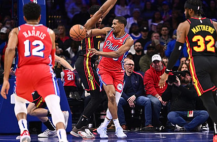 Dec 8, 2023; Philadelphia, Pennsylvania, USA; Philadelphia 76ers guard De'Anthony Melton (8) passes the ball against Atlanta Hawks forward De'Andre Hunter (12) in the first quarter at Wells Fargo Center. Mandatory Credit: Kyle Ross-USA TODAY Sports