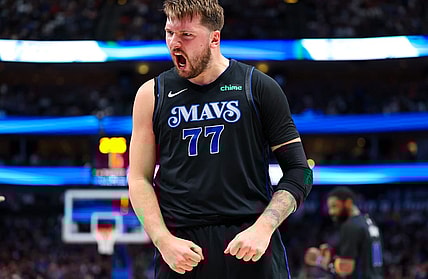 Feb 22, 2024; Dallas, Texas, USA;  Dallas Mavericks guard Luka Doncic (77) reacts during the first half against the Phoenix Suns at American Airlines Center. Mandatory Credit: Kevin Jairaj-USA TODAY Sports