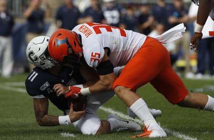 Sep 7, 2019; East Hartford, CT, USA; Illinois Fighting Illini linebacker Jake Hansen (35) sacks Connecticut Huskies quarterback Jack Zergiotis (11) in the second quarter at Pratt & Whitney Stadium at Rentschler Field. Mandatory Credit: David Butler II-USA TODAY Sports
