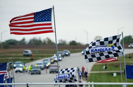 Oct 18, 2020; Kansas City, Kansas, USA; A general view of flags as fans enter Kansas Speedway before the Hollywood Casino 400. Mandatory Credit: Jay Biggerstaff-USA TODAY Sports