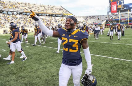 Nov 14, 2020; Morgantown, West Virginia, USA; West Virginia Mountaineers safety Tykee Smith (23) celebrates after defeating the TCU Horned Frogs at Mountaineer Field at Milan Puskar Stadium. Mandatory Credit: Ben Queen-USA TODAY Sports