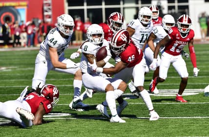 Oct 16, 2021; Bloomington, Indiana, USA; Michigan State Spartans wide receiver Jalen Nailor (8) is tackled by Indiana Hoosiers linebacker Aaron Casey (46) during the first quarter at Memorial Stadium. Mandatory Credit: Marc Lebryk-USA TODAY Sports