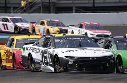Aug 15, 2021; Speedway, Indiana, USA; NASCAR Cup Series driver AJ Allmendinger (16) during the Verizon 200 at the Brickyard at Indianapolis Motor Speedway Road Course. Mandatory Credit: Mike Dinovo-USA TODAY Sports