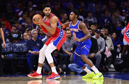 Nov 4, 2022; Philadelphia, Pennsylvania, USA; Philadelphia 76ers forward Tobias Harris (12) holds the ball against New York Knicks forward RJ Barrett (9) in the second quarter at Wells Fargo Center. Mandatory Credit: Kyle Ross-USA TODAY Sports