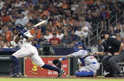 May 16, 2023; Houston, Texas, USA; Houston Astros left fielder Corey Julks (9) hits a double against there Chicago Cubs in the fourth inning at Minute Maid Park. Mandatory Credit: Thomas Shea-USA TODAY Sports