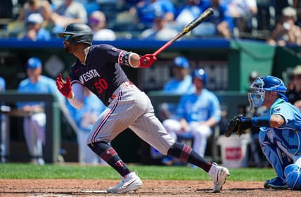 Jul 30, 2023; Kansas City, Missouri, USA; Minnesota Twins left fielder Willi Castro (50) hits a single against the Kansas City Royals during the seventh inning at Kauffman Stadium. Mandatory Credit: Jay Biggerstaff-USA TODAY Sports