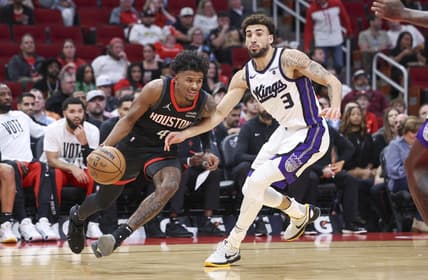 Nov 4, 2023; Houston, Texas, USA; Houston Rockets guard Jalen Green (4) drives with the ball as Sacramento Kings guard Chris Duarte (3) defends during the first quarter at Toyota Center. Mandatory Credit: Troy Taormina-USA TODAY Sports