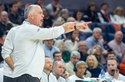 Virginia Tech Hokies head coach Mike Young talks with his team on the sideline as Auburn Tigers take on Virginia Tech Hokies at Neville Arena in Auburn, Ala., on Wednesday, Nov. 29, 2023. Auburn Tigers leads Virginia Tech Hokies 33-24 at halftime.