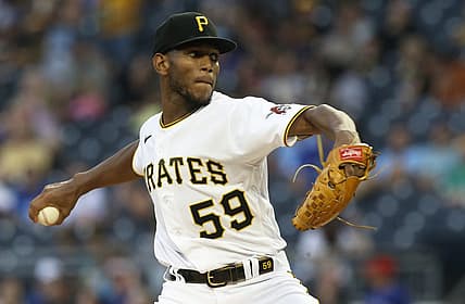 Sep 3, 2022; Pittsburgh, Pennsylvania, USA; Pittsburgh Pirates starting pitcher Roansy Contreras (59) delivers a pitch against the Toronto Blue Jays during the first inning  at PNC Park. Mandatory Credit: Charles LeClaire-USA TODAY Sports