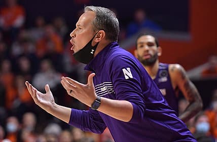 Feb 13, 2022; Champaign, Illinois, USA;  Northwestern Wildcats head coach Chris Collins reacts from the bench during the first half against the Illinois Fighting Illini at State Farm Center. Mandatory Credit: Ron Johnson-USA TODAY Sports