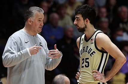 Purdue Boilermakers head coach Matt Painter talks to Purdue Boilermakers guard Ethan Morton (25) during the NCAA men   s basketball game against the Rutgers Scarlet Knights, Monday, Jan. 2, 2023, at Mackey Arena in West Lafayette, Ind. Rutgers Scarlet Knights won 65-64.

Purduerutgersmbb010223 Am01914