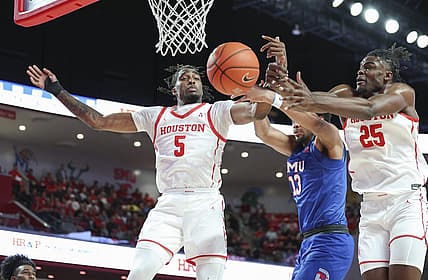 Jan 5, 2023; Houston, Texas, USA; Houston Cougars forward Ja'Vier Francis (5) and forward Jarace Walker (25) attempt to get the ball away from Southern Methodist Mustangs center Mo Njie (13) during the second half at Fertitta Center. Mandatory Credit: Troy Taormina-USA TODAY Sports