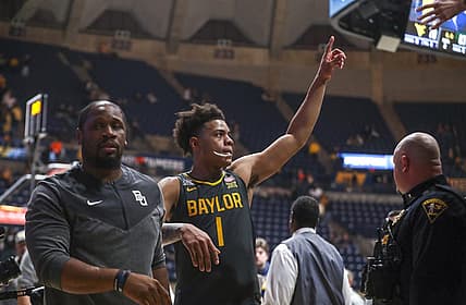 Jan 11, 2023; Morgantown, West Virginia, USA; Baylor Bears guard Keyonte George (1) celebrates after defeating the West Virginia Mountaineers at WVU Coliseum. Mandatory Credit: Ben Queen-USA TODAY Sports
