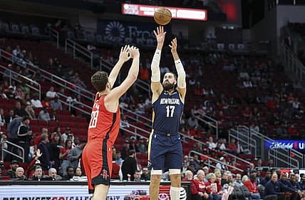Mar 19, 2023; Houston, Texas, USA; New Orleans Pelicans center Jonas Valanciunas (17) shoots the ball over Houston Rockets center Alperen Sengun (28) during the first quarter at Toyota Center. Mandatory Credit: Troy Taormina-USA TODAY Sports