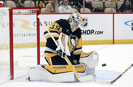 Sep 24, 2023; Pittsburgh, Pennsylvania, USA;  Pittsburgh Penguins goalie Alex Nedeljkovic (39) makes a save against the Columbus Blue Jackets during the first period at PPG Paints Arena. Mandatory Credit: Charles LeClaire-USA TODAY Sports