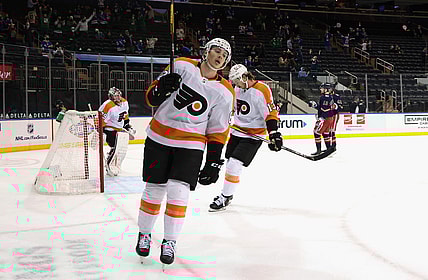 Mar 17, 2021; New York, New York, USA; Philadelphia Flyers center Connor Bunnaman (82) and the Philadelphia Flyers react following a second period goal by New York Rangers center Filip Chytil (72) that made the score 9-0 at Madison Square Garden at Madison Square Garden. Mandatory Credit:  Bruce Bennett/POOL PHOTOS-USA TODAY Sports