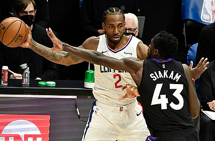 May 4, 2021; Los Angeles, California, USA; LA Clippers forward Kawhi Leonard (2) is defendedd by Toronto Raptors forward Pascal Siakam (43) during the third quarter at Staples Center. Mandatory Credit: Robert Hanashiro-USA TODAY Sports