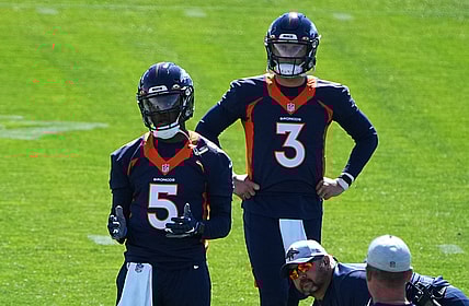 Jun 1, 2021; Englewood, Colorado, USA; Denver Broncos quarterback Teddy Bridgewater (5) and quarterback Drew Lock (3) during organized team activities at the UCHealth Training Center. Mandatory Credit: Ron Chenoy-USA TODAY Sports