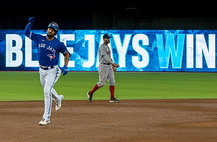 Aug 7, 2021; Toronto, Ontario, CAN; Toronto Blue Jays shortstop Marcus Semien (10) hits a walk off home run against the Boston Red Sox during the seventh inning at Rogers Centre. Mandatory Credit: Kevin Sousa-USA TODAY Sports