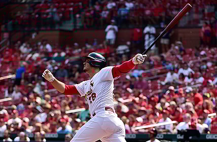 Sep 12, 2021; St. Louis, Missouri, USA;  St. Louis Cardinals third baseman Nolan Arenado (28) hits a two run home run during the first inning against the Cincinnati Reds at Busch Stadium. Mandatory Credit: Jeff Curry-USA TODAY Sports