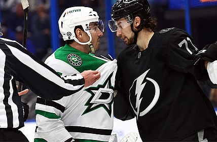Jan 15, 2022; Tampa, Florida, USA; Dallas Stars defenseman Joel Hanley (44) and Tampa Bay Lightning left wing Pierre-Edouard Bellemare (41) talk during the first period at Amalie Arena. Mandatory Credit: Kim Klement-USA TODAY Sports