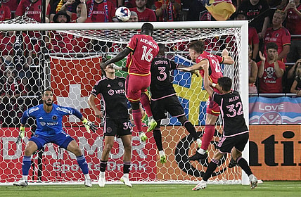 Jul 15, 2023; St. Louis, Missouri, USA; St. Louis City player Samuel Adeniran (16) heads the ball for a goal against Inter Miami midfielder Dixon Arroyo (3) and Inter Miami goalkeeper Drake Callender (1) in the first half at CITYPARK. Mandatory Credit: Scott Rovak-USA TODAY Sports