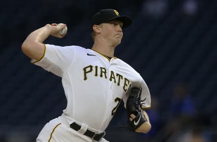Sep 15, 2021; Pittsburgh, Pennsylvania, USA; Pittsburgh Pirates starting pitcher Mitch Keller (23) delivers against the Cincinnati Reds during the first inning at PNC Park. Mandatory Credit: Charles LeClaire-USA TODAY Sports