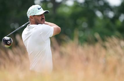 Jun 17, 2022; Brookline, Massachusetts, USA; Brooks Koepka plays his shot from the 10th tee during the second round of the U.S. Open golf tournament. Mandatory Credit: John David Mercer-USA TODAY Sports
