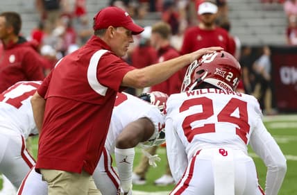 Sep 17, 2022; Lincoln, Nebraska, USA;  Oklahoma Sooners head coach Brent Venables greets Oklahoma Sooners defensive back Gentry Williams (24) before the game against the Nebraska Cornhuskers at Memorial Stadium. Mandatory Credit: Kevin Jairaj-USA TODAY Sports