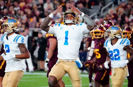 Nov 5, 2022; Tempe, AZ, USA; UCLA Bruins quarterback Dorian Thompson-Robinson (1) reacts after running for a touchdown against the Arizona State Sun Devils in the first half at Sun Devil Stadium. Mandatory Credit: Rob Schumacher-Arizona Republic

Ncaa Ucla At Asu