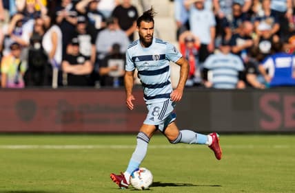 Oct 2, 2022; Kansas City, Kansas, USA; Sporting Kansas City midfielder Graham Zusi (8) controls the ball during the first half against the Seattle Sounders at Children's Mercy Park. Mandatory Credit: Jay Biggerstaff-USA TODAY Sports