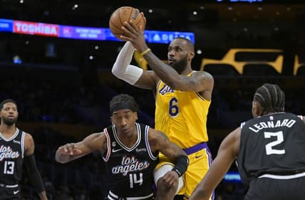 Jan 24, 2023; Los Angeles, California, USA; Los Angeles Lakers forward LeBron James (6) passes the ball over Los Angeles Clippers guard Terance Mann (14) as guard Paul George (13) and forward Kawhi Leonard (2) look on in the first quarter at Crypto.com Arena. Mandatory Credit: Jayne Kamin-Oncea-USA TODAY Sports