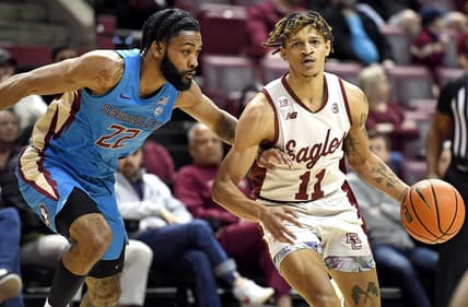 Feb 18, 2023; Tallahassee, Florida, USA; Boston College Eagles guard Makai Ashton-Langford (11) drives to the net past Florida State Seminoles guard Darin Green Jr (22) during the first half at Donald L. Tucker Center. Mandatory Credit: Melina Myers-USA TODAY Sports