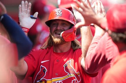 Mar 18, 2023; Jupiter, Florida, USA;  St. Louis Cardinals third baseman Taylor Motter (55) is congratulated by teammates after hitting a home run in the second inning against the Detroit Tigers at Roger Dean Stadium. Mandatory Credit: Jim Rassol-USA TODAY Sports