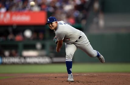 Apr 10, 2023; San Francisco, California, USA; Los Angeles Dodgers starting pitcher Julio Urias (7) delivers a pitch against the San Francisco Giants during the first inning at Oracle Park. Mandatory Credit: D. Ross Cameron-USA TODAY Sports