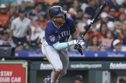 Jul 7, 2023; Houston, Texas, USA; Seattle Mariners center fielder Julio Rodriguez (44) drives in two runs with an RBI single during the fourth inning against the Houston Astros at Minute Maid Park. Mandatory Credit: Troy Taormina-USA TODAY Sports