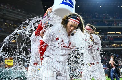 Jul 25, 2023; Philadelphia, Pennsylvania, USA; Philadelphia Phillies infielder Alec Bohm (28) is doused with water after the game for hitting a game-winning RBI single against the Baltimore Orioles at Citizens Bank Park. Mandatory Credit: Kyle Ross-USA TODAY Sports