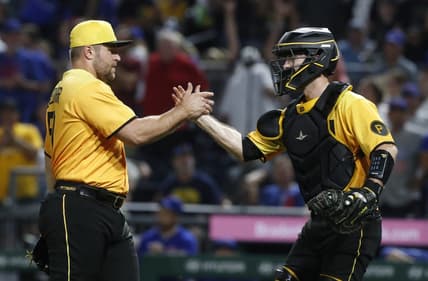 Aug 25, 2023; Pittsburgh, Pennsylvania, USA; Pittsburgh Pirates relief pitcher David Bednar (51) and catcher Jason Delay (55) shake hands after defeating the Chicago Cubs at PNC Park. Pittsburgh won 2-1. Mandatory Credit: Charles LeClaire-USA TODAY Sports