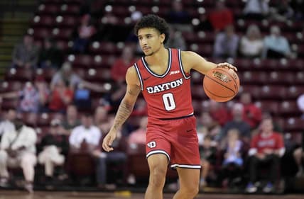 Nov 19, 2023; Charleston, SC, USA; Dayton Flyers guard Javon Bennett (0) brings the ball up court in the second half against the Houston Cougars at TD Arena. Mandatory Credit: David Yeazell-USA TODAY Sports