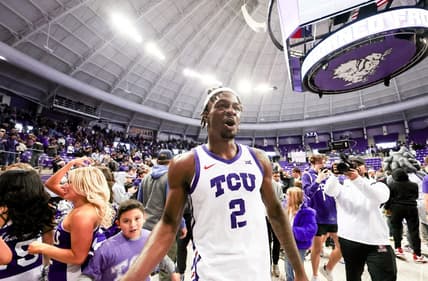 Jan 13, 2024; Fort Worth, Texas, USA; TCU Horned Frogs forward Emanuel Miller (2) celebrates with fans after the game against the Houston Cougars at Ed and Rae Schollmaier Arena. Mandatory Credit: Kevin Jairaj-USA TODAY Sports