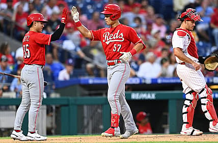 Aug 24, 2022; Philadelphia, Pennsylvania, USA; Cincinnati Reds outfielder Stuart Fairchild (57) celebrates with infielder Alejo Lopez (35) after hitting a home run against the Philadelphia Phillies in the second inning at Citizens Bank Park. Mandatory Credit: Kyle Ross-USA TODAY Sports