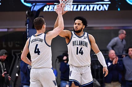 Dec 21, 2022; Villanova, Pennsylvania, USA; Villanova Wildcats guard Caleb Daniels (14) and guard Chris Arcidiacono (4) celebrate after the game against the Saint John's Red Storm at William B. Finneran Pavilion. Mandatory Credit: Kyle Ross-USA TODAY Sports