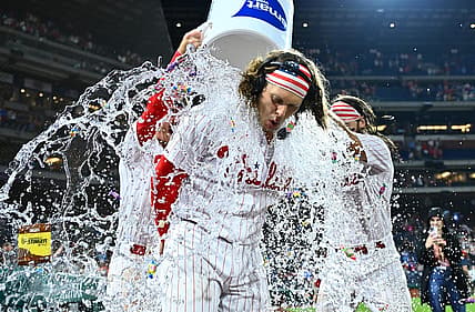 Jul 25, 2023; Philadelphia, Pennsylvania, USA; Philadelphia Phillies infielder Alec Bohm (28) is doused with water after the game for hitting a game-winning RBI single against the Baltimore Orioles at Citizens Bank Park. Mandatory Credit: Kyle Ross-USA TODAY Sports